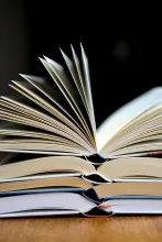 stack of open books